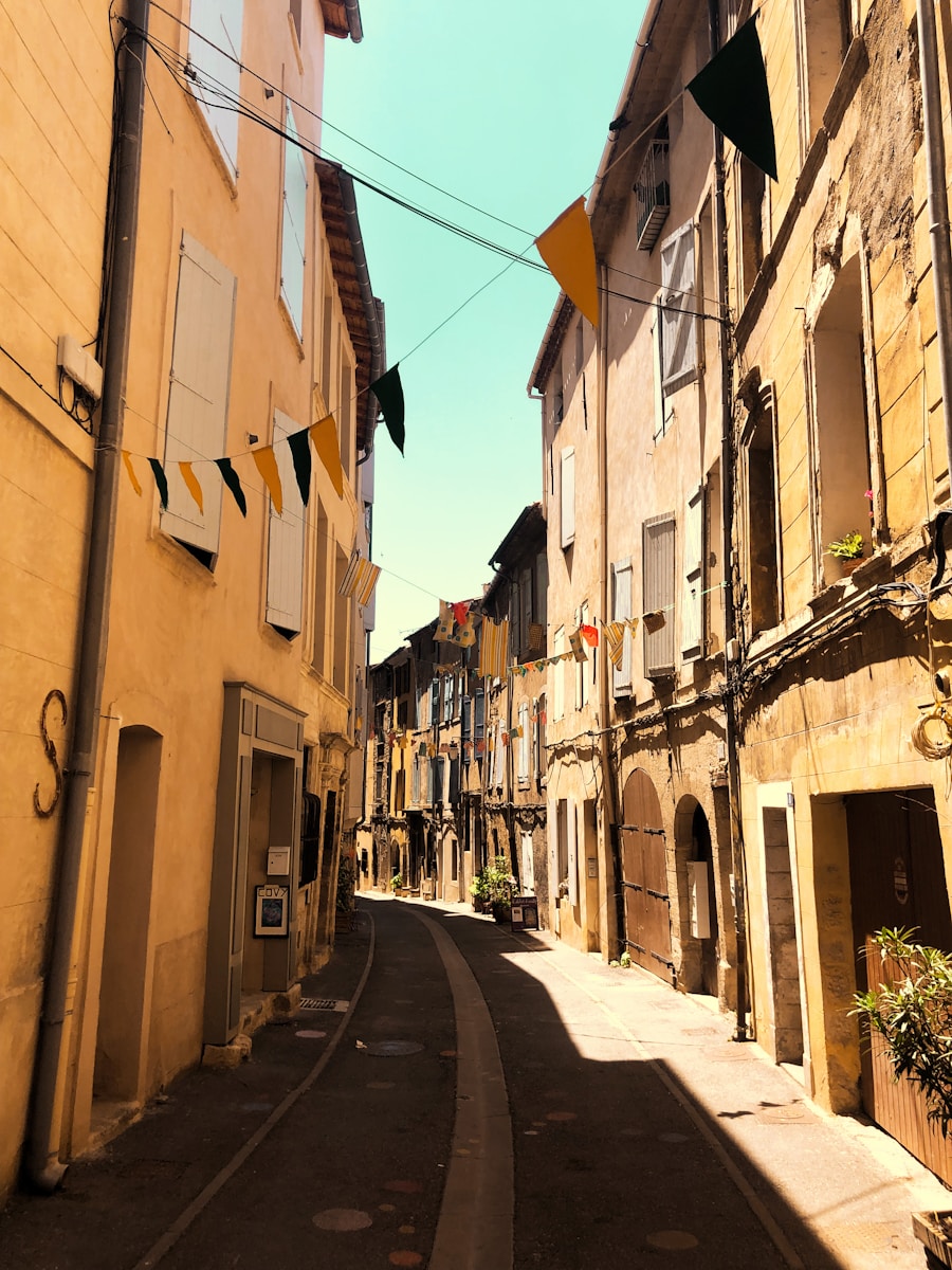 Photo by Linus Fritz a narrow street between buildings