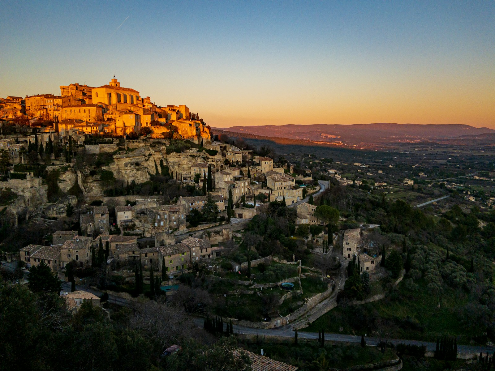 Photo by ricardo frantz aerial view of city during sunset