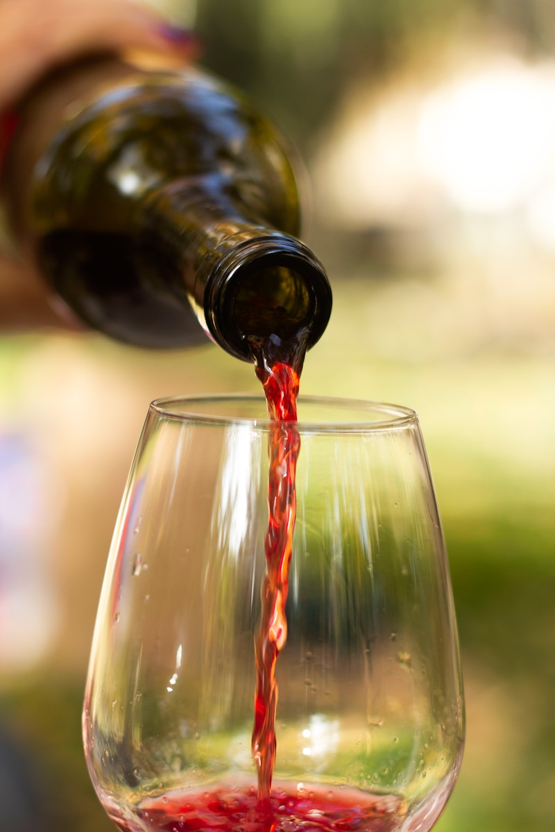 Photo by Christine Isakzhanova clear wine glass with red wine